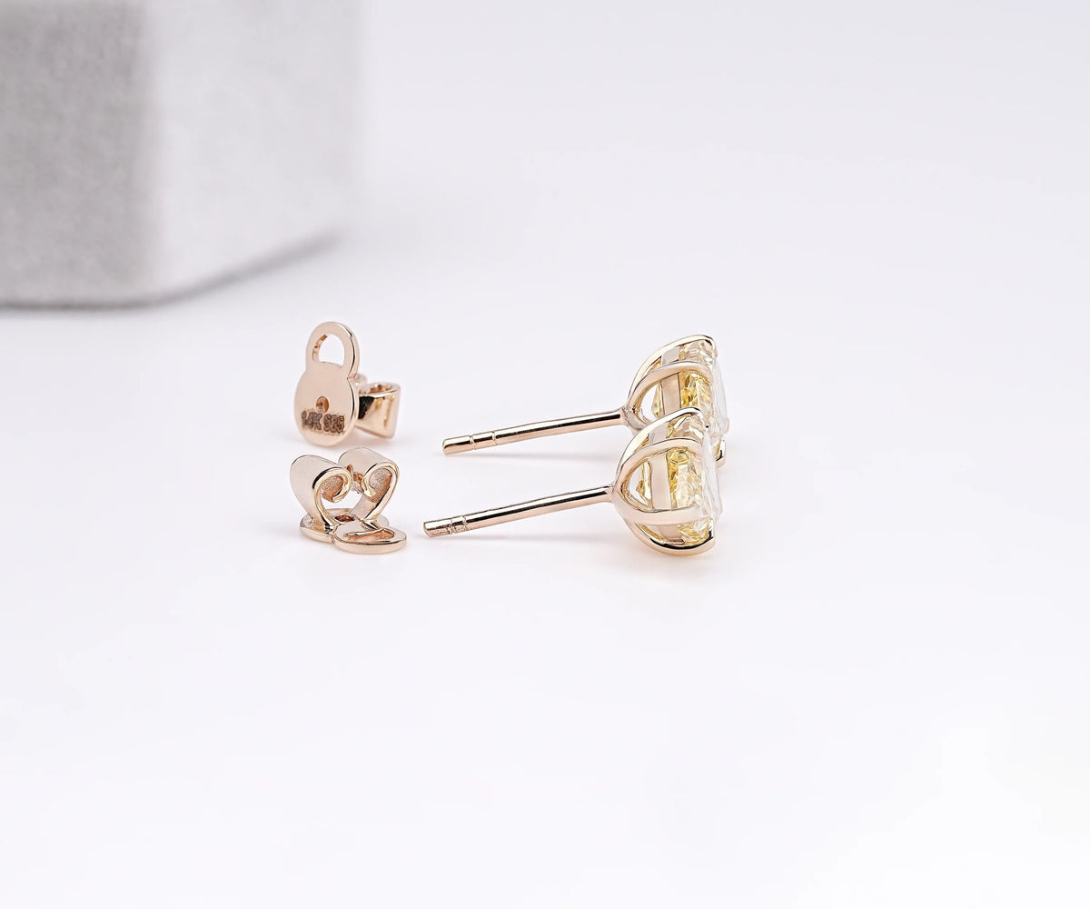 East West Pear Shape Yellow Lab Diamond Anniversary Earrings