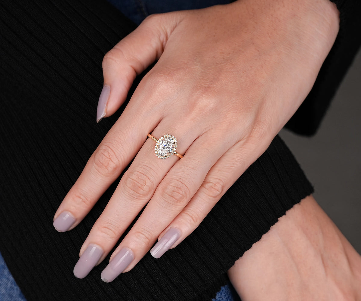 Oval lab grown diamond pavé halo engagement ring