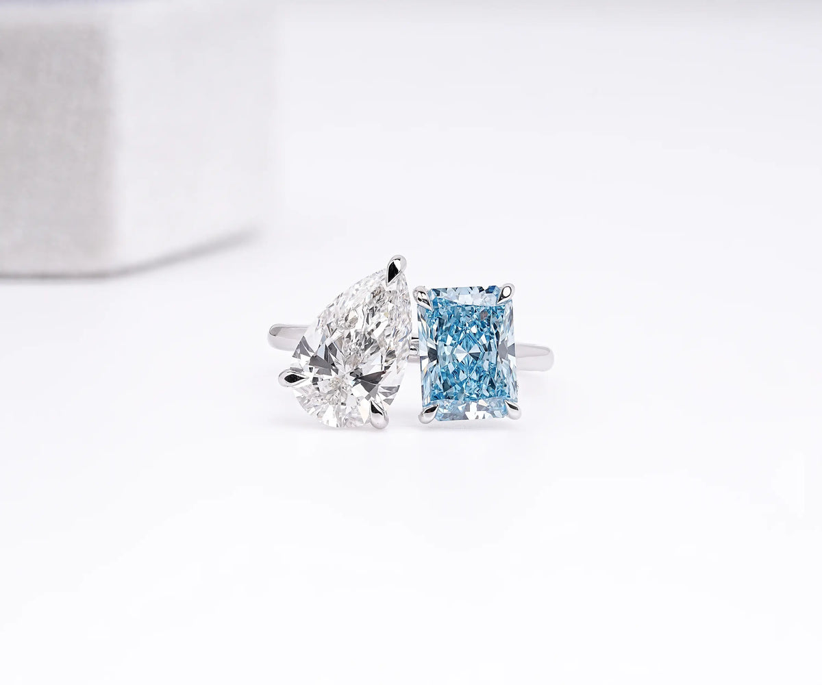 Pear and radiant cut toi et moi lab grown diamond engagement ring
