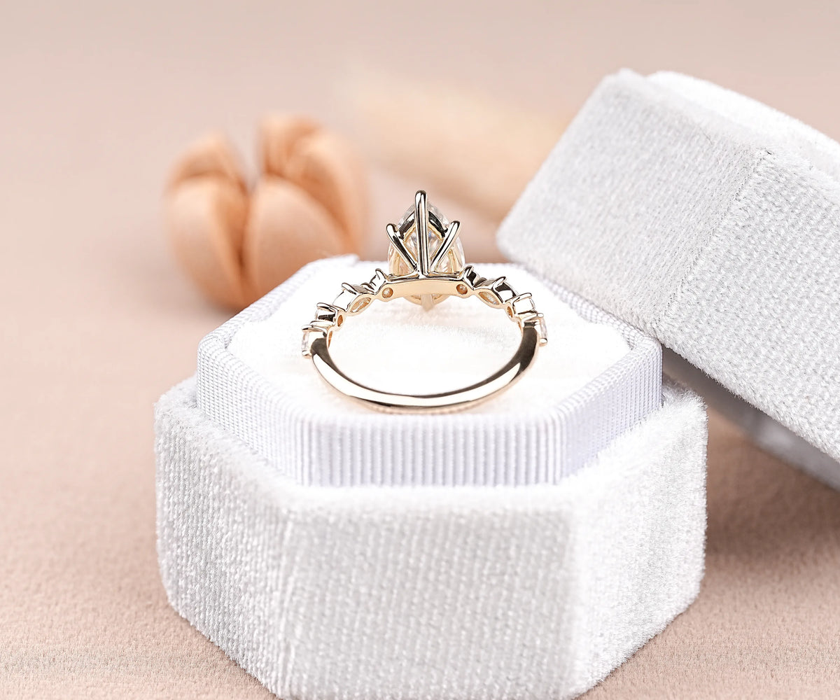 Pear cut lab diamond solitaire ring with diamond accents