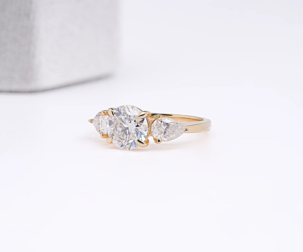 Three Stone Round And Pear Lab Grown Diamond Anniversary Ring