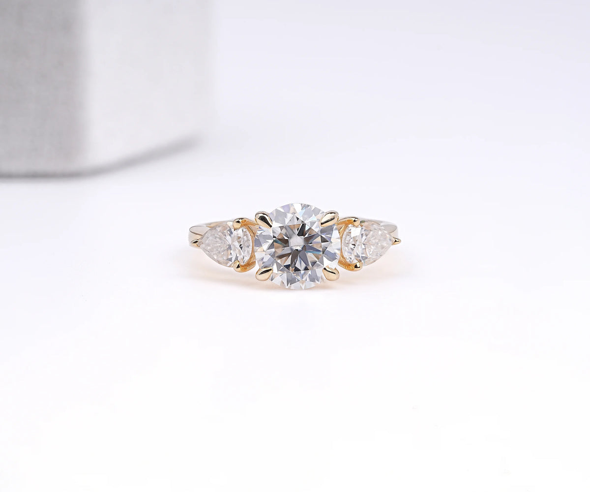 Three Stone Round And Pear Lab Grown Diamond Anniversary Ring