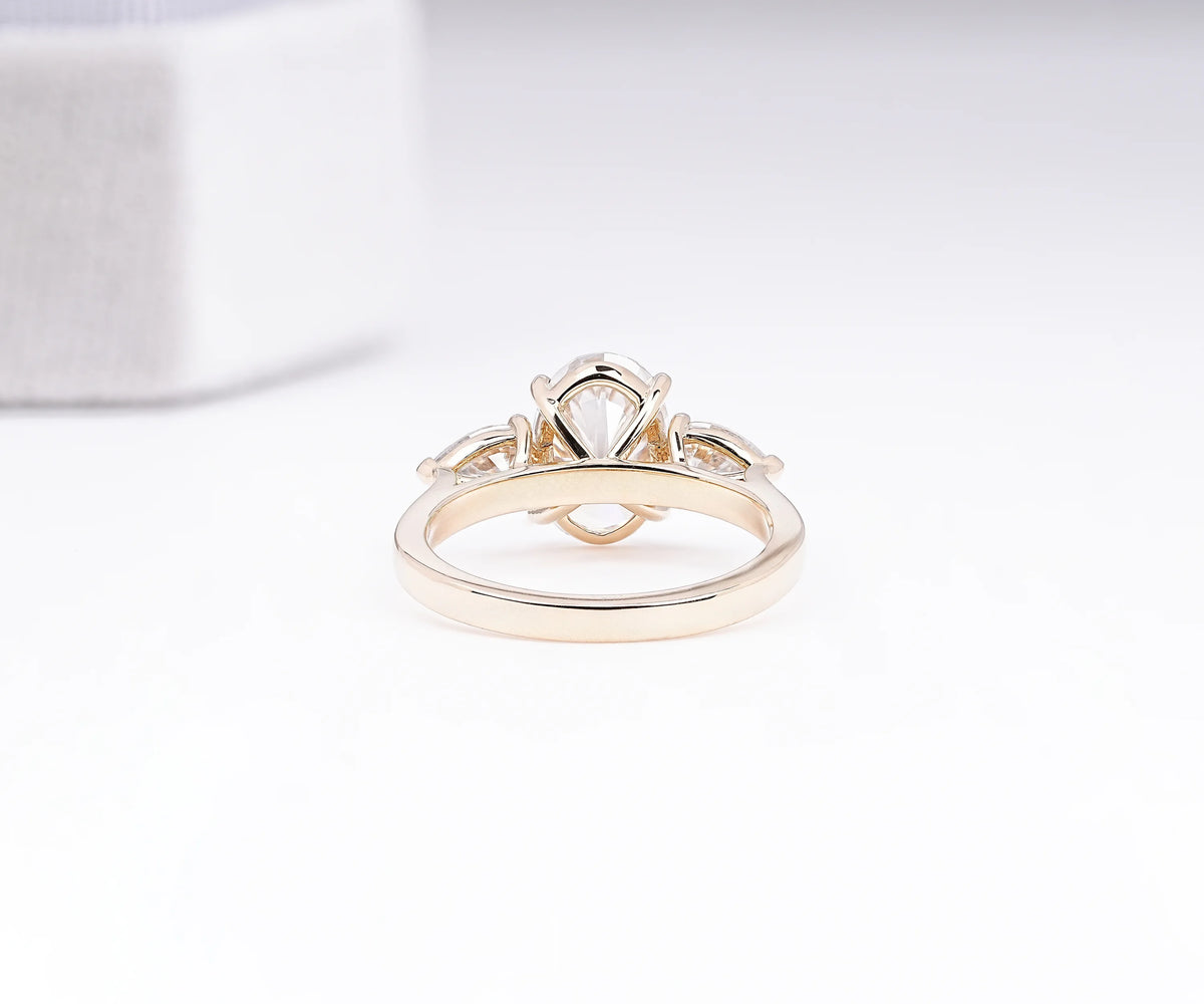 Oval & Pear Lab Grown Diamond Three Stone Engagement Ring