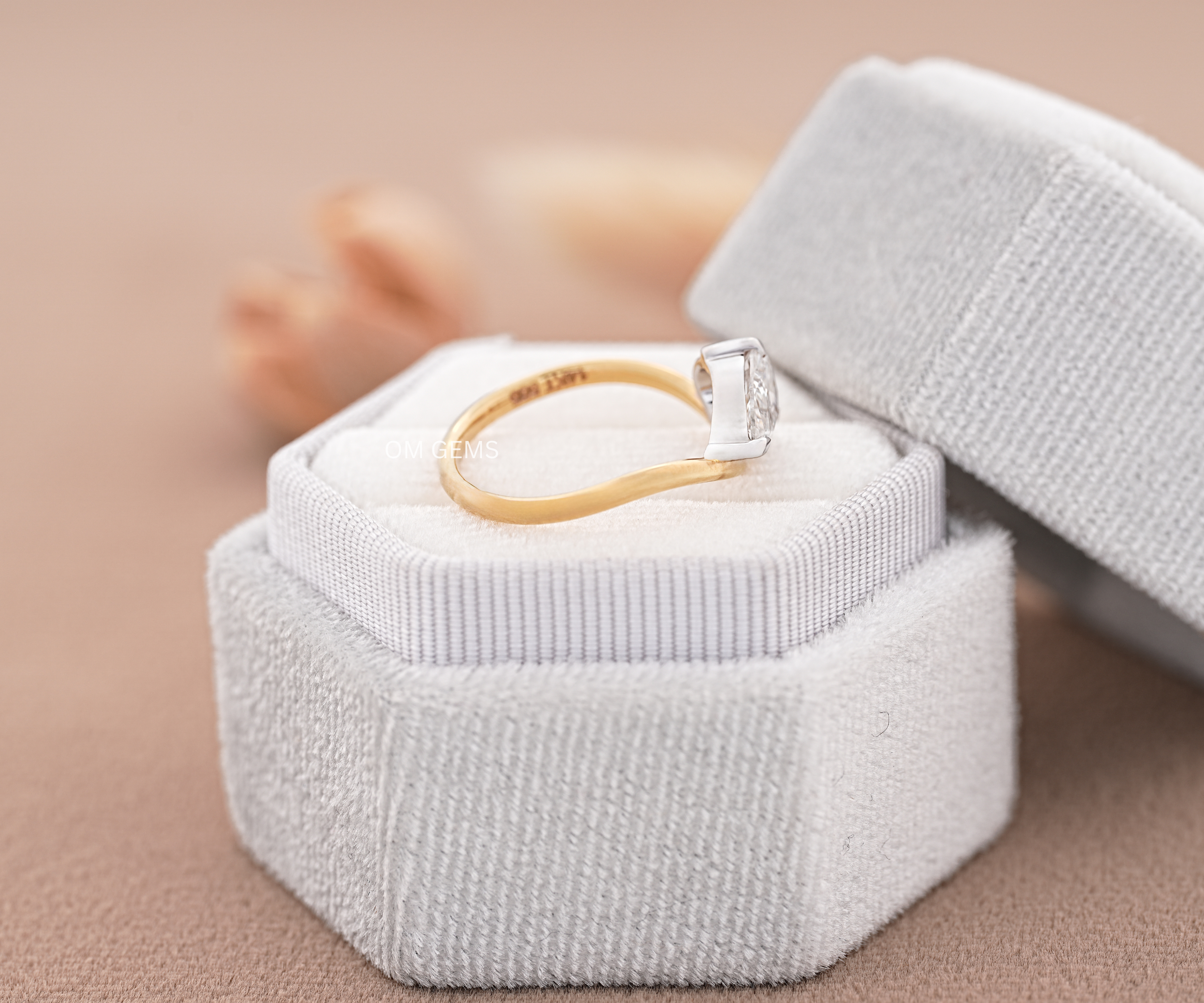 East-West Pear Shaped Engagement Ring