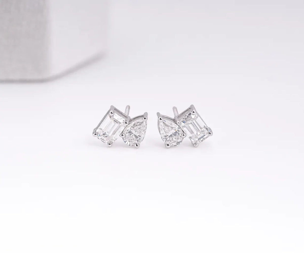 Toi et Moi Emerald Pear Shape Lab Grown Diamond Stud Earrings