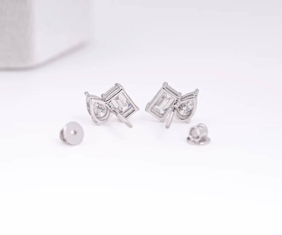 Toi et Moi Emerald Pear Shape Lab Grown Diamond Stud Earrings
