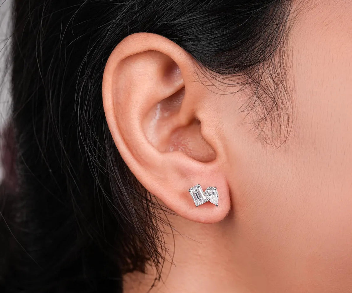 Toi et Moi Emerald Pear Shape Lab Grown Diamond Stud Earrings