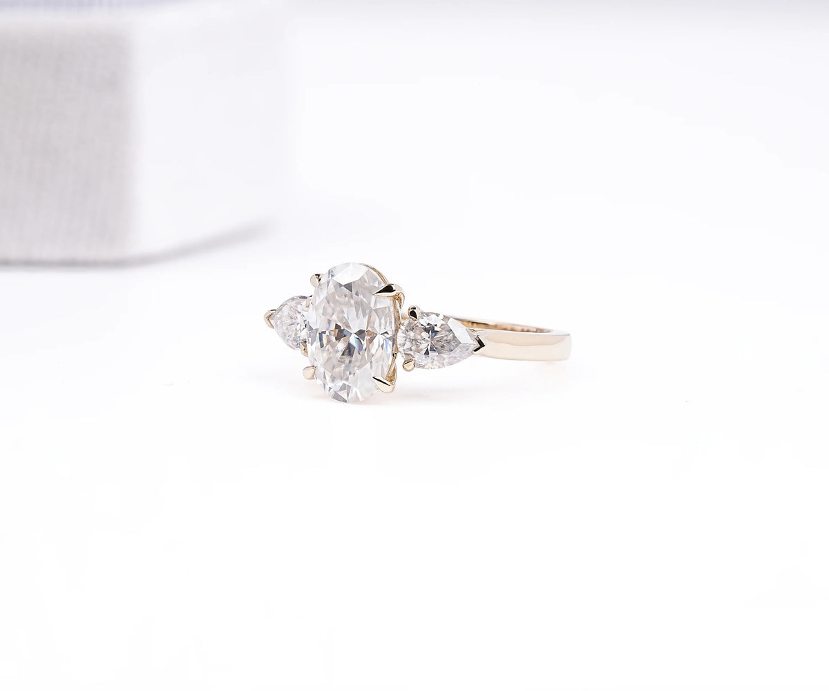Oval & Pear Lab Grown Diamond Three Stone Engagement Ring