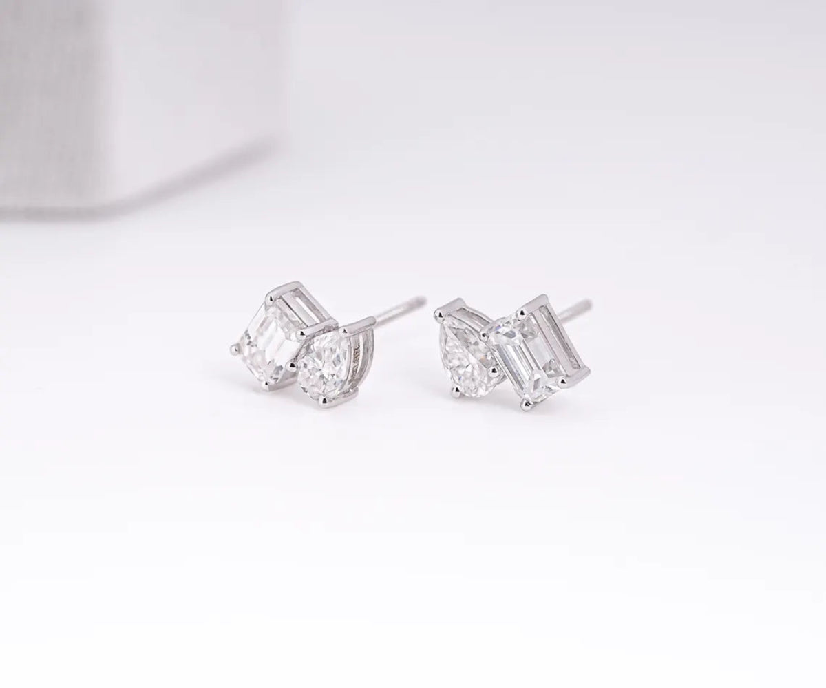 Toi et Moi Emerald Pear Shape Lab Grown Diamond Stud Earrings
