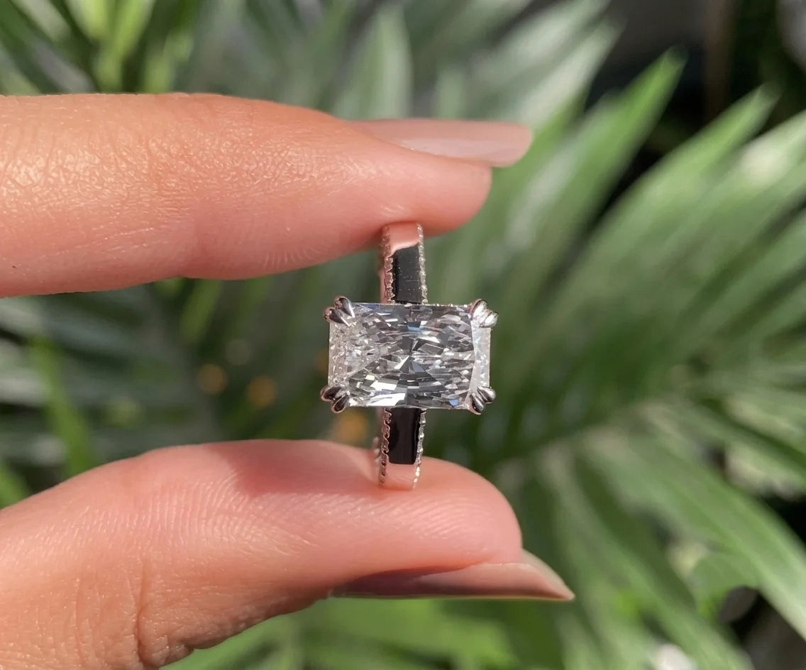 Cathedral solitaire radiant lab diamond ring with secret halo