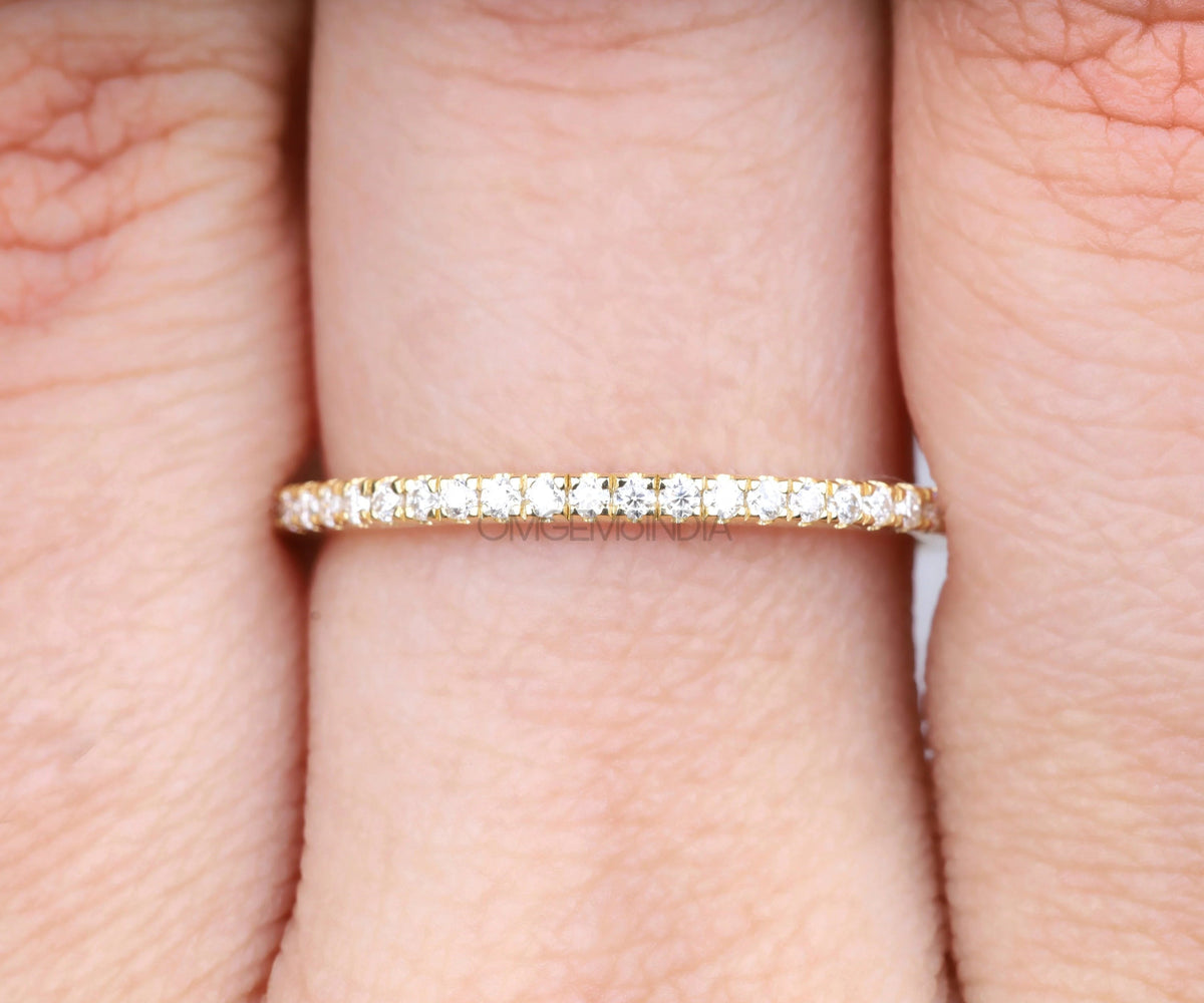 Dainty round diamond pavé wedding ring