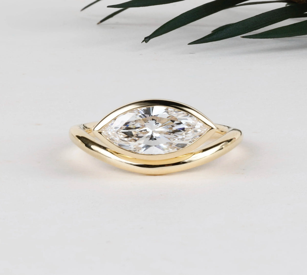 East west bezel set marquise lab grown diamond anniversary ring