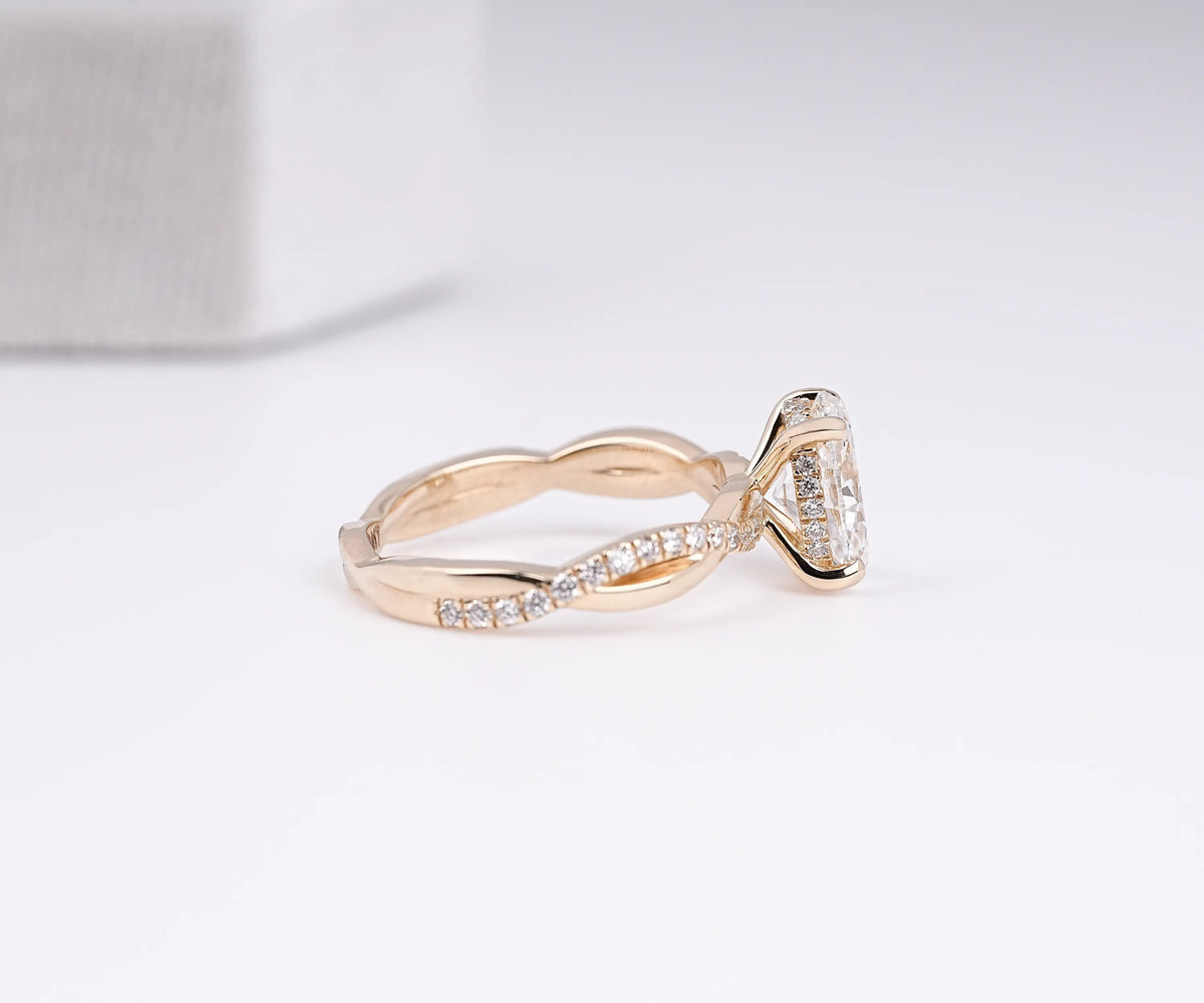 Lab grown oval diamond twist shank engagement ring