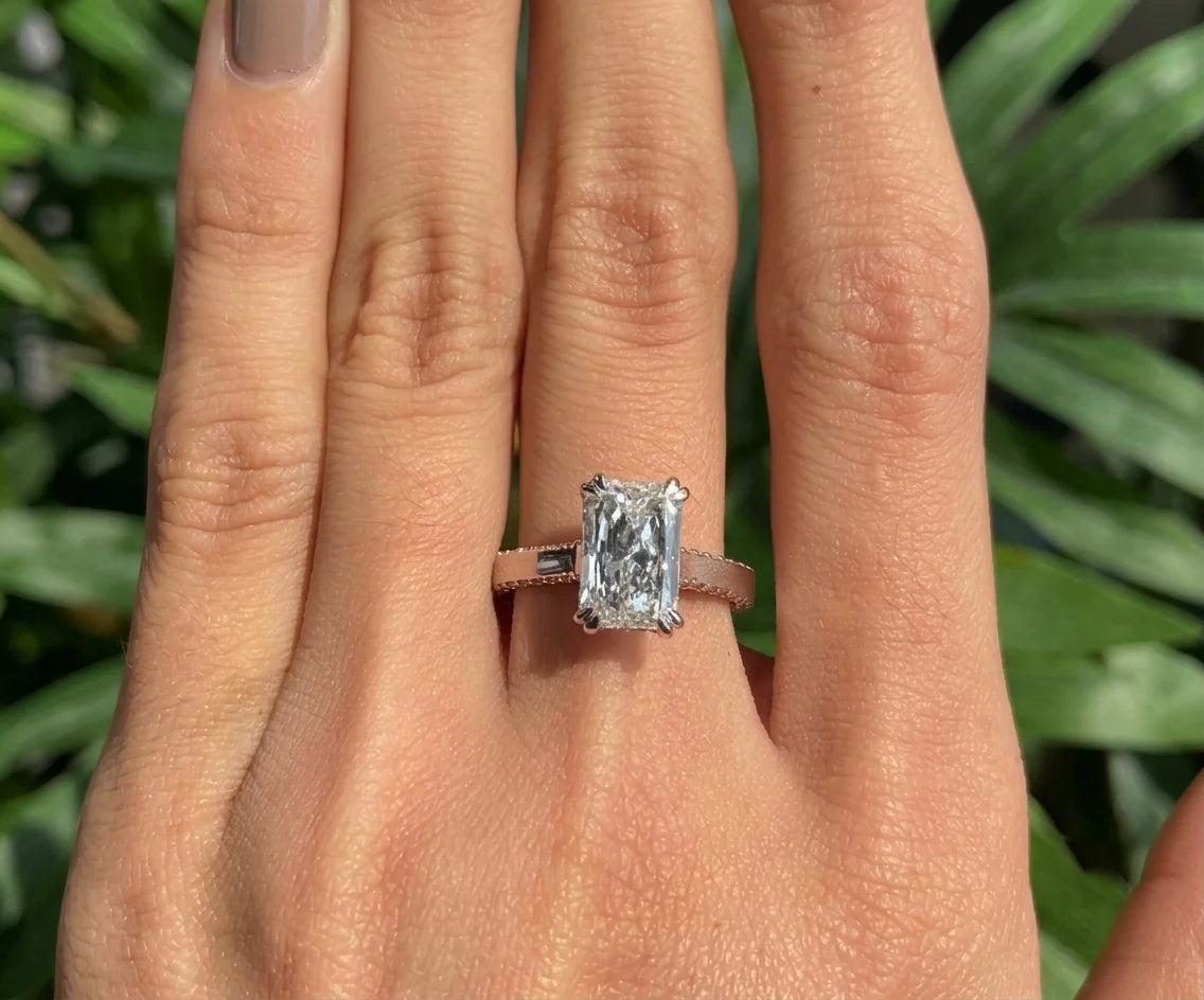 Lab grown radiant diamond cathedral ring with hidden accent halo