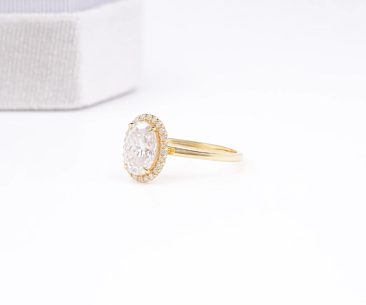 Oval cut lab grown diamond surround halo ring