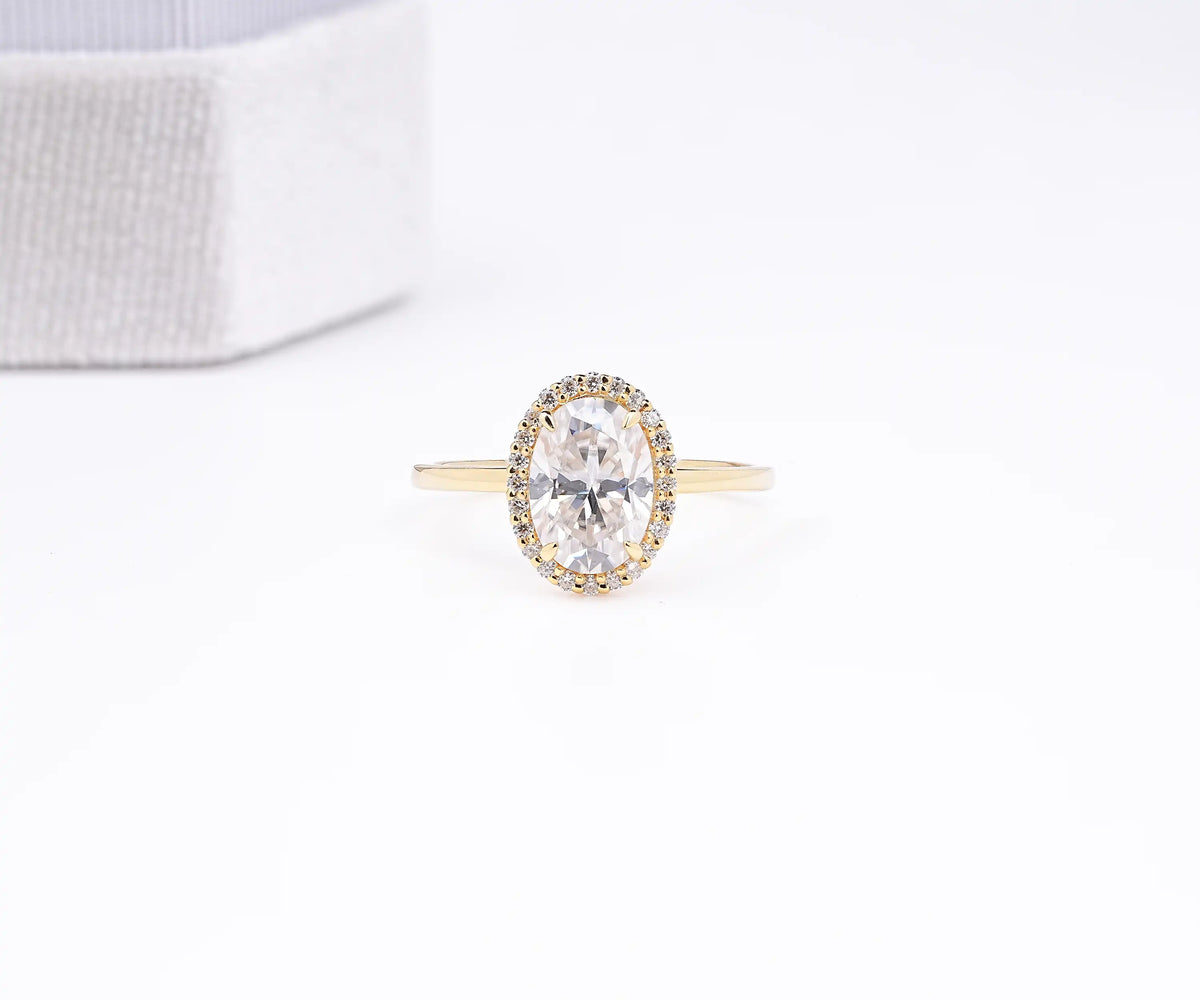 Oval lab grown diamond halo engagement ring
