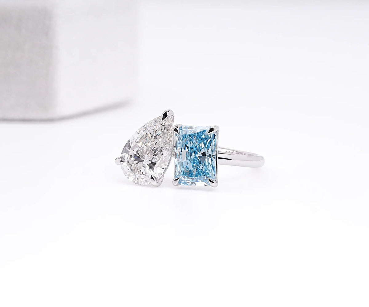 Pear and radiant cut lab grown diamond toi et moi ring