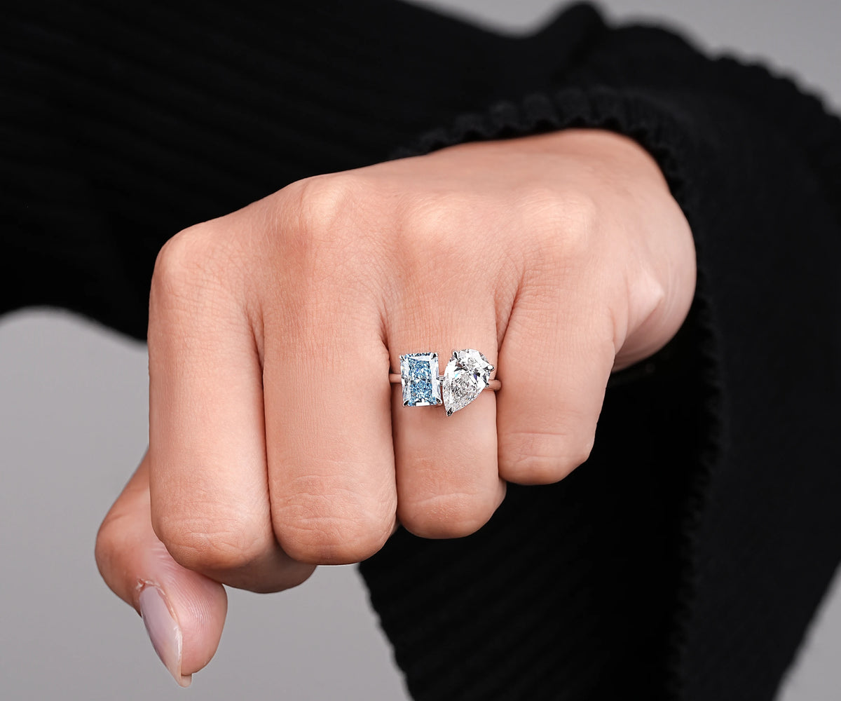 Pear and radiant lab grown diamond toi et moi engagement ring