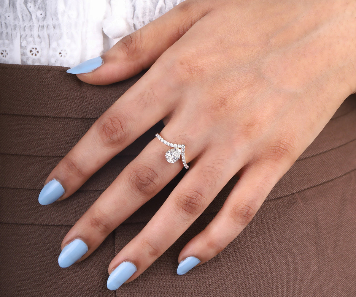 Pear cut lab diamond V shaped pavé engagement ring