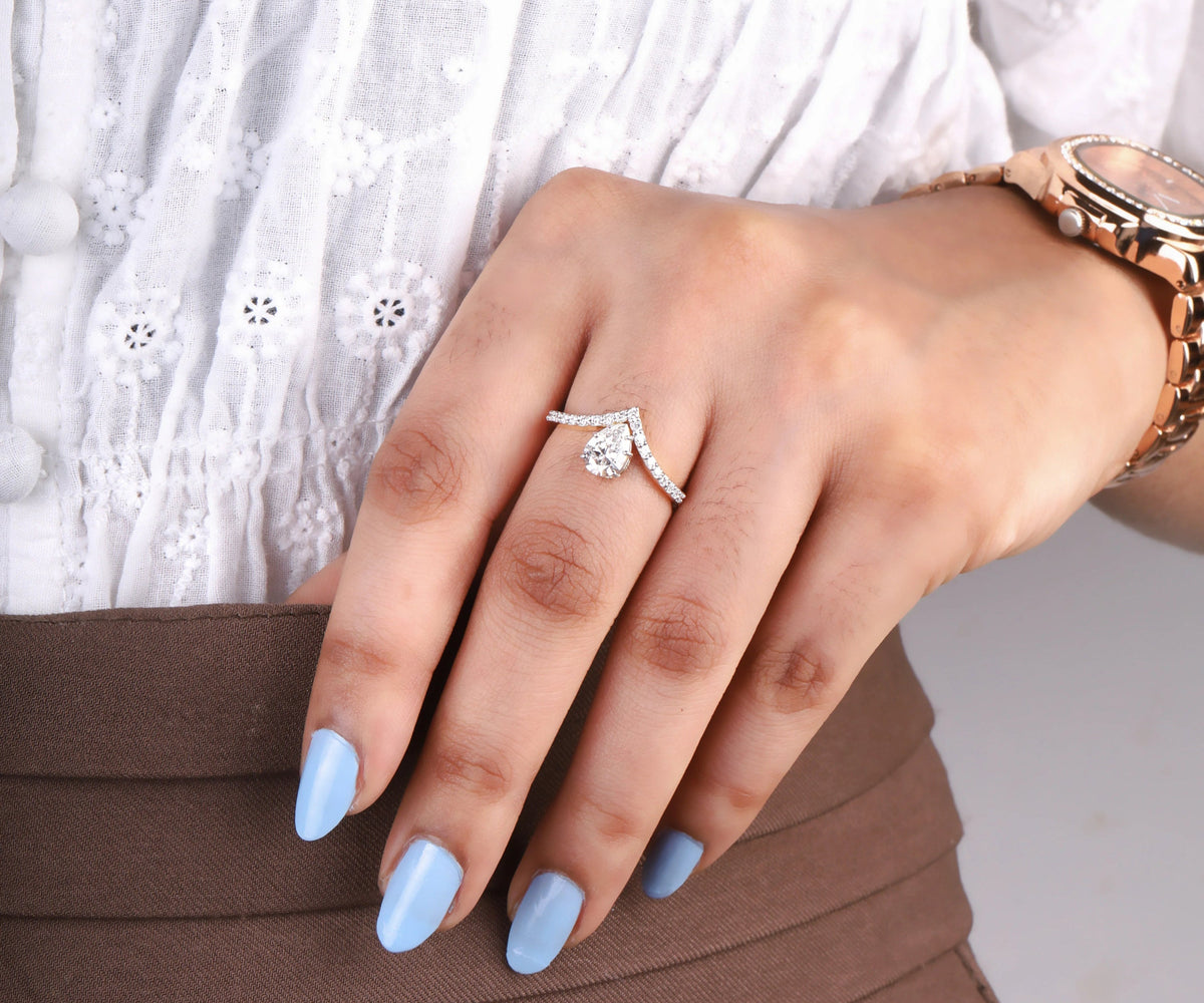 Pear cut lab grown diamond chevron pavé engagement ring