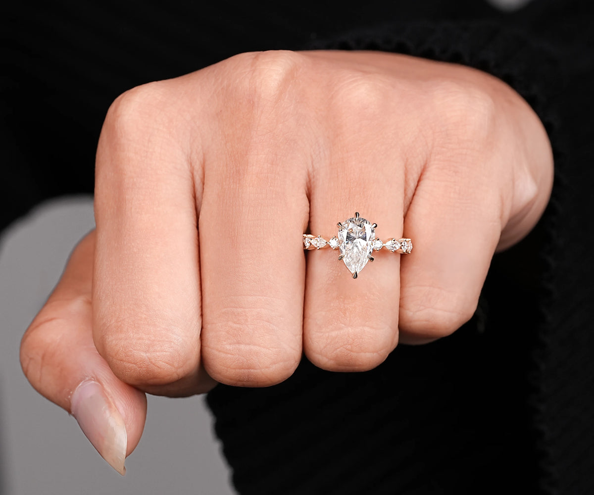 Pear cut lab grown diamond solitaire accent ring