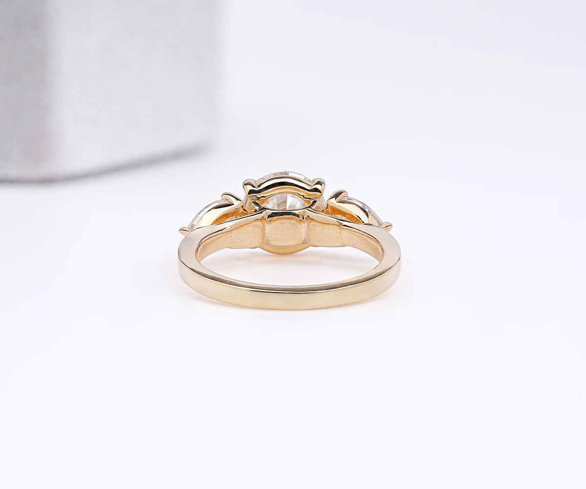 Three Stone Round And Pear Lab Grown Diamond Anniversary Ring